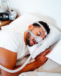 man wearing CPAP